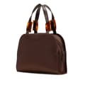 Miniatyrbillede 2 af 10: Pre-owned Yves Saint Laurent Nylon Tortoiseshell Handbag Brown