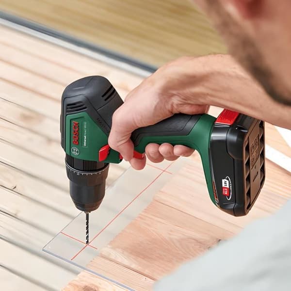 Paket med 2 Bosch-verktyg - UniversalImpact 18 slagborr + PST 18 sticksåg (2 batts, 1 laddare, 1 låda) - 06039D410B