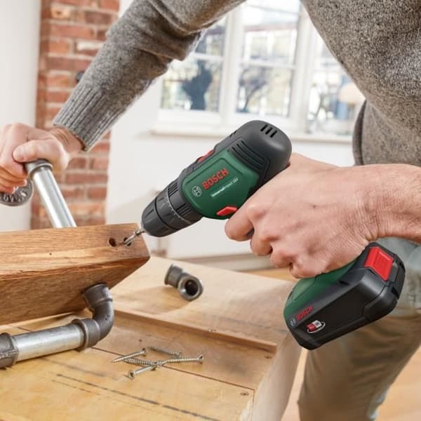 Paket med 2 Bosch-verktyg - UniversalImpact 18 slagborr + PST 18 sticksåg (2 batts, 1 laddare, 1 låda) - 06039D410B