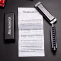 Miniatyrbild 5 av 5: Lollanda 10-håls titanharmonica – munspel i C-dur för barn och nybörjare