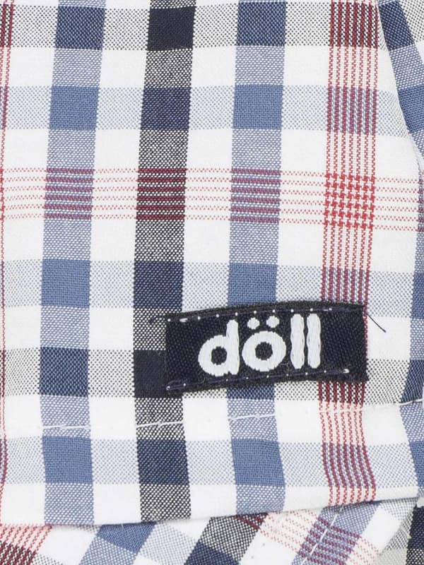 Pojkkeps med snörning, Döll