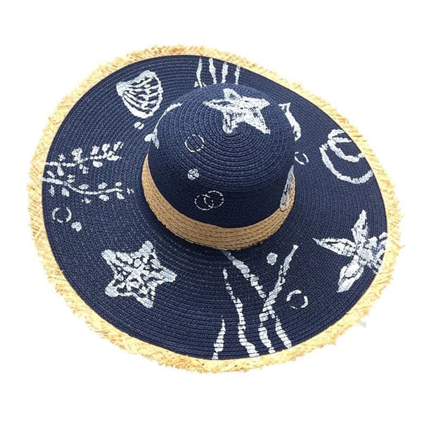 Navy blue floppy hat with hand painted decorations
