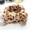 Miniatyrbild 2 av 3: Bandeau för Hår i Tryckt Leopardfärgad Fleece Almond Beige