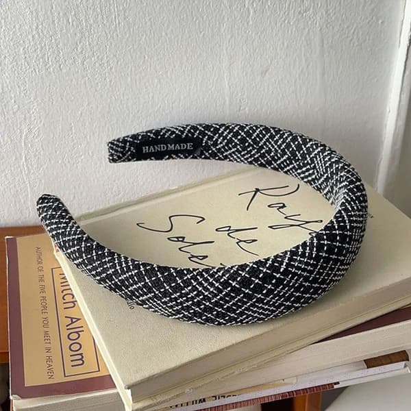Bred hårband i svart rutigt tweed