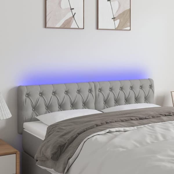 vidaXL sengegavl med LED-lys 144x7x78/88 cm stof lysegrå