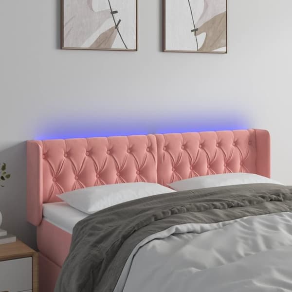 vidaXL sengegavl med LED-lys 163x16x78/88 cm fløjl lyserød