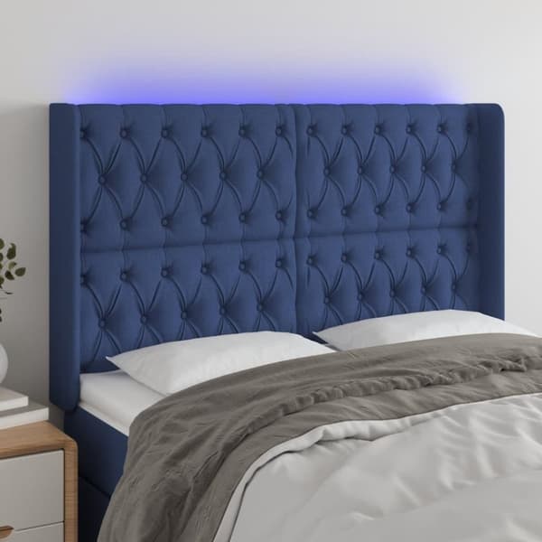vidaXL sengegavl med LED-lys 147x16x118/128 cm stof blå