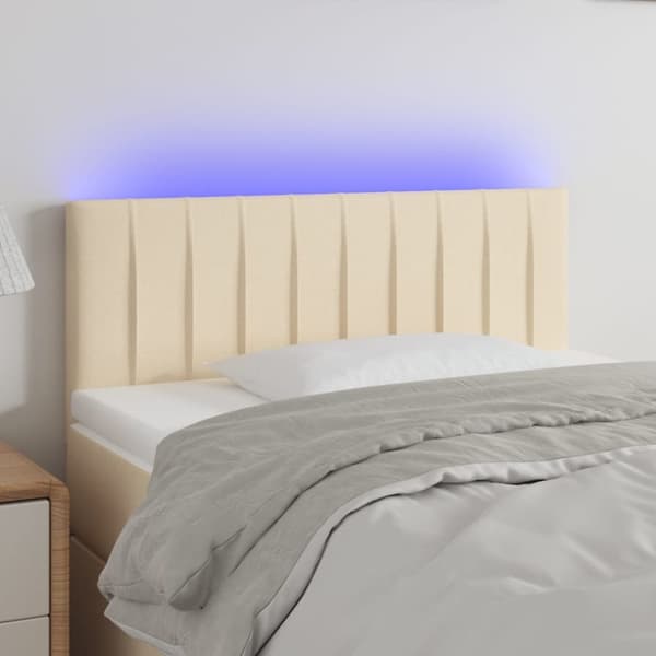 sengegavl med LED-lys 90x5x78/88 cm stof cremefarvet