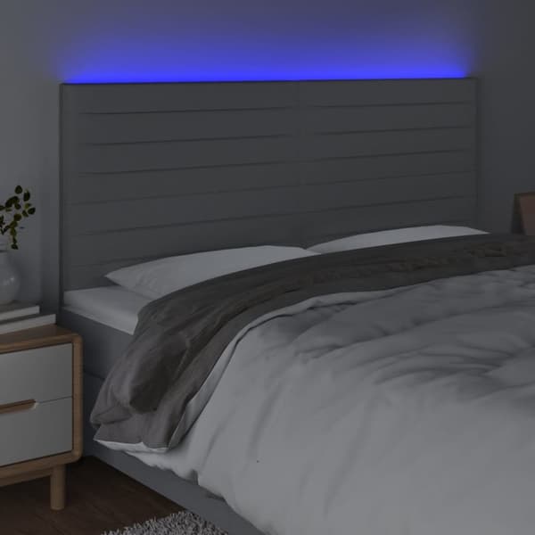 sengegavl med LED-lys 200x5x118/128 cm stof lysegrå