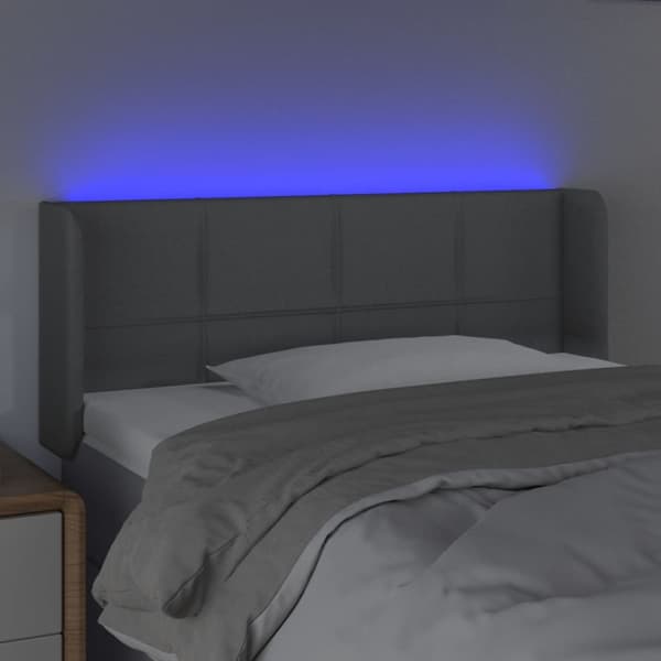 sengegavl med LED-lys 83x16x78/88 cm stof lysegrå