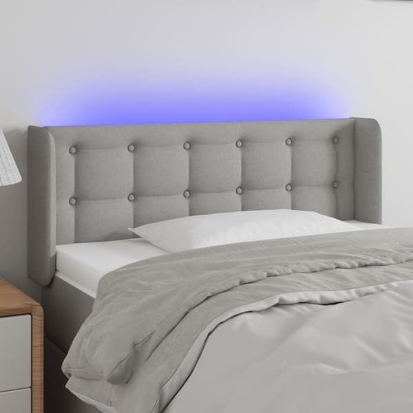 sengegavl med LED-lys 83x16x78/88 cm stof lysegrå