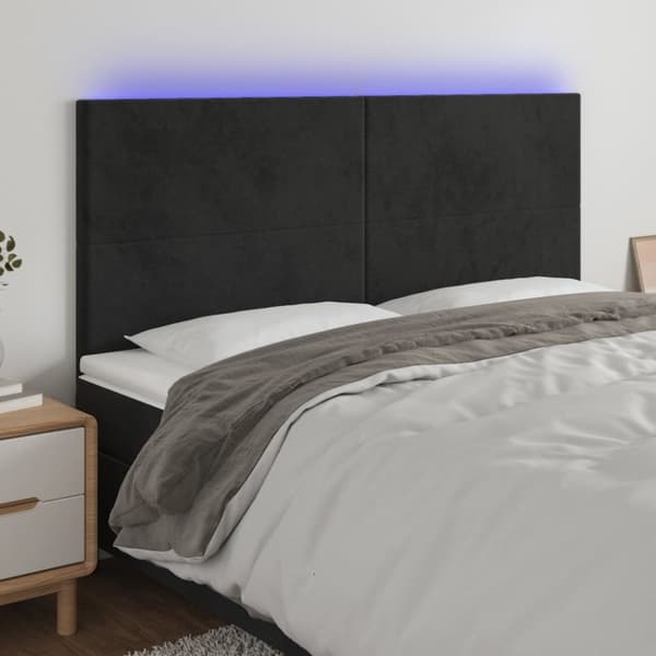 sengegavl med LED-lys 200x5x118/128 cm fløjl sort