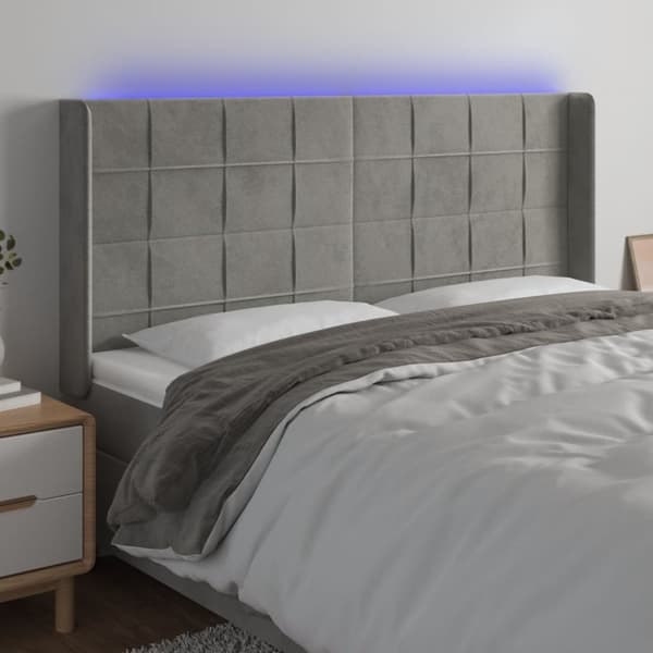 sengegavl med LED-lys 203x16x118/128 cm fløjl lysegrå