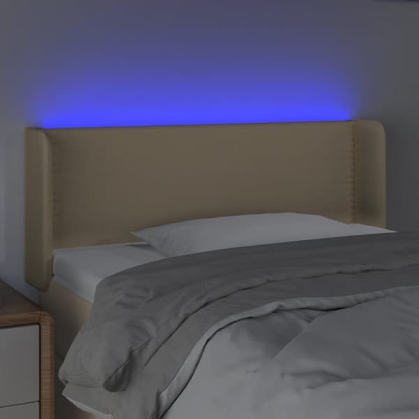 sengegavl med LED-lys 103x16x78/88 cm stof cremefarvet