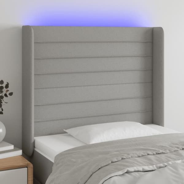 sengegavl med LED-lys 93x16x118/128 cm stof lysegrå