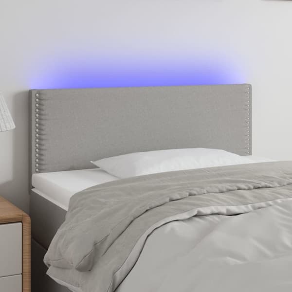 sengegavl med LED-lys 100x5x78/88 cm stof lysegrå