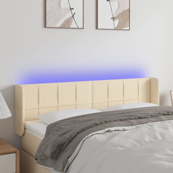 sengegavl med LED-lys 147x16x78/88 cm stof cremefarvet