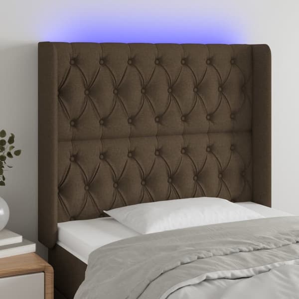 sengegavl med LED-lys 103x16x118/128 cm stof mørkebrun