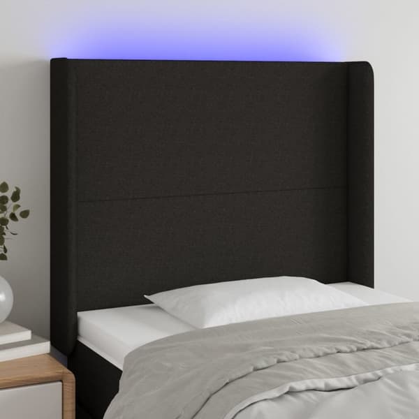 sengegavl med LED-lys 83x16x118/128 cm stof sort