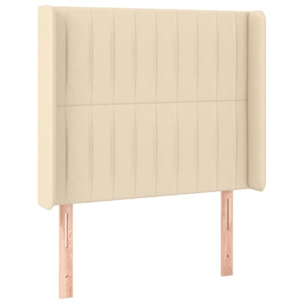 sengegavl med LED-lys 83x16x118/128 cm stof cremefarvet