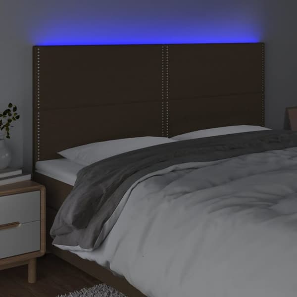 sengegavl med LED-lys 180x5x118/128 cm stof mørkebrun