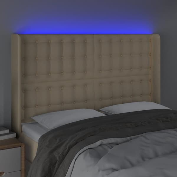 sengegavl med LED-lys 147x16x118/128 cm stof cremefarvet