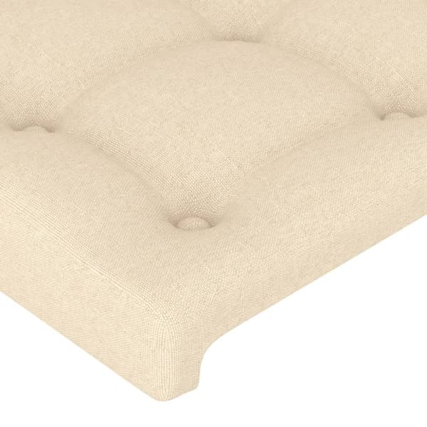 sengegavl med LED-lys 147x16x118/128 cm stof cremefarvet