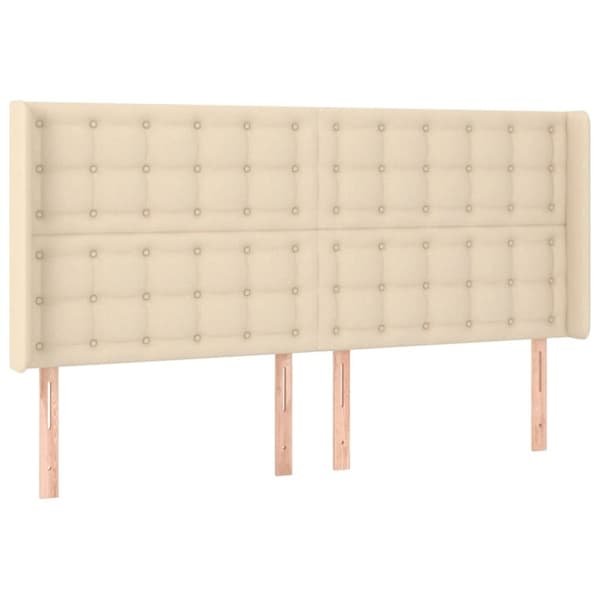 sengegavl med LED-lys 203x16x118/128 cm stof cremefarvet