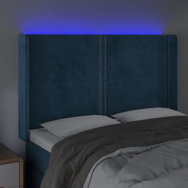sengegavl med LED-lys 147x16x118/128 cm fløjl mørkeblå