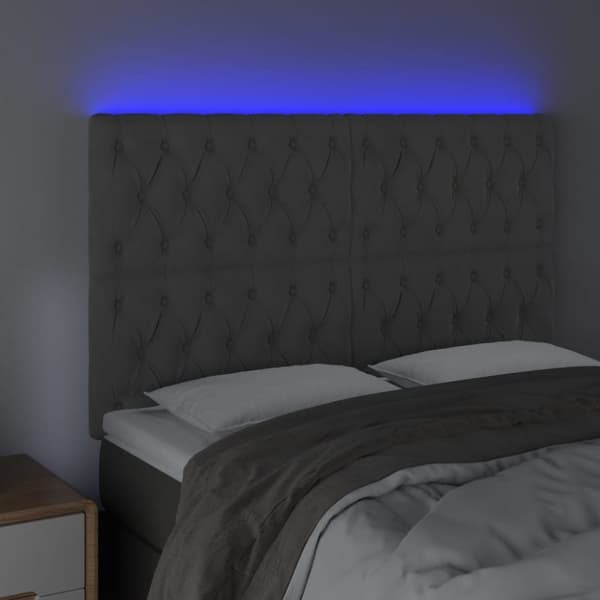 sengegavl med LED-lys 144x7x118/128 cm fløjl mørkegrå