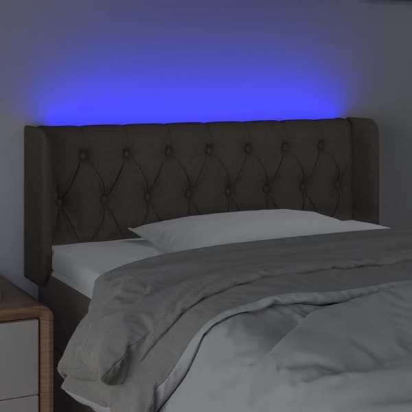 Sänggavel LED taupe 103x16x78/88 cm tyg