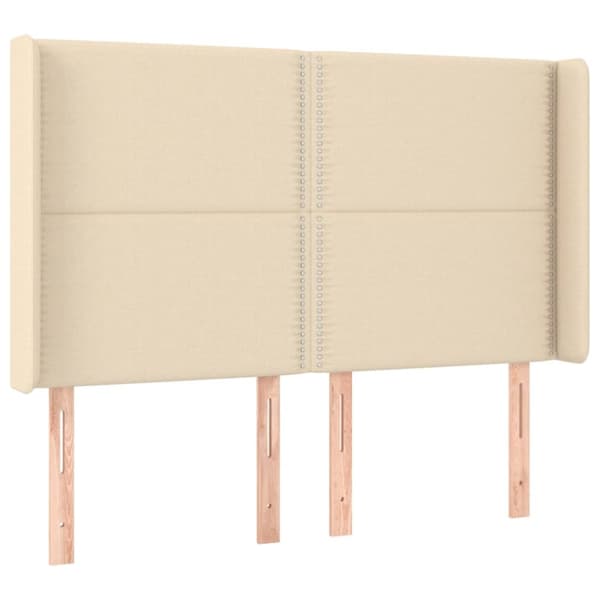 sengegavl med LED-lys 147x16x118/128 cm stof cremefarvet