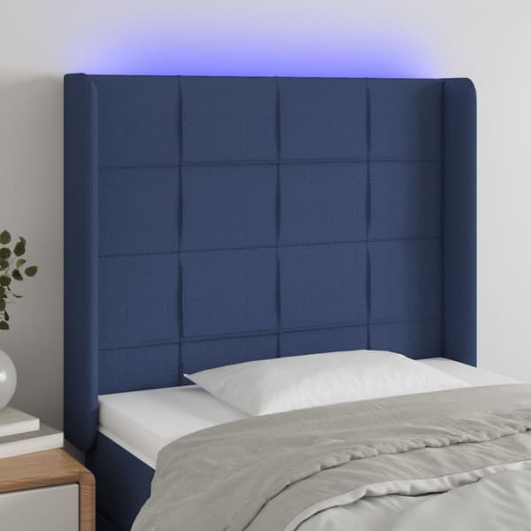 sengegavl med LED-lys 103x16x118/128 cm stof blå