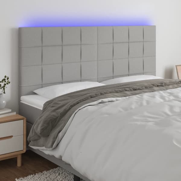sengegavl med LED-lys 200x5x118/128 cm stof lysegrå