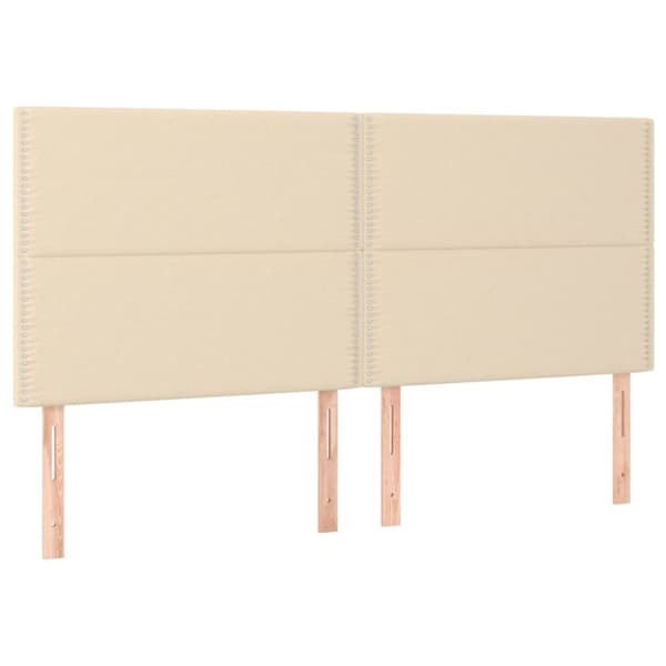 sengegavl med LED-lys 200x5x118/128 cm stof Cremefarvet