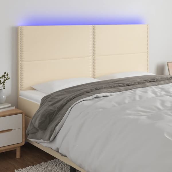 sengegavl med LED-lys 200x5x118/128 cm stof Cremefarvet