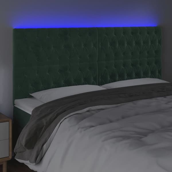 sengegavl med LED-lys 200x7x118/128 cm fløjl mørkegrøn