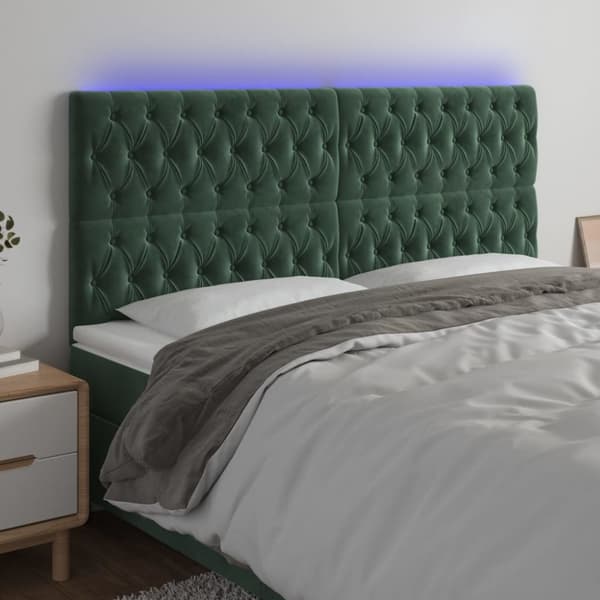 sengegavl med LED-lys 200x7x118/128 cm fløjl mørkegrøn