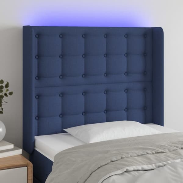 sengegavl med LED-lys 83x16x118/128 cm stof blå