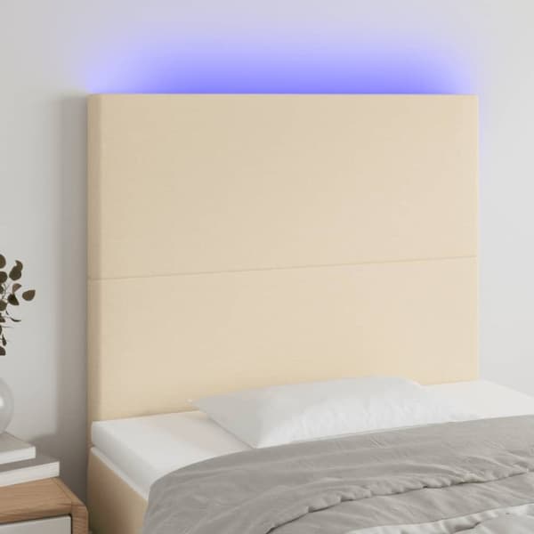 sengegavl med LED-lys 90x5x118/128 cm stof cremefarvet
