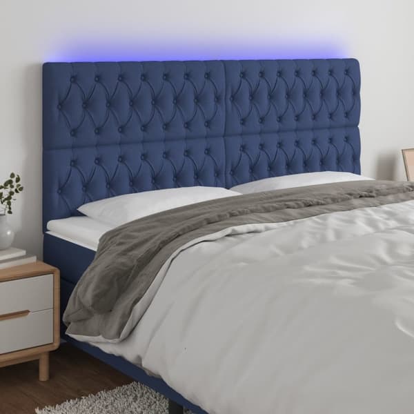 sengegavl med LED-lys 180x7x118/128 cm stof blå