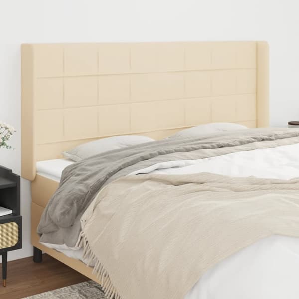 sengegavl med kanter 183x16x118/128 cm stof cremefarvet