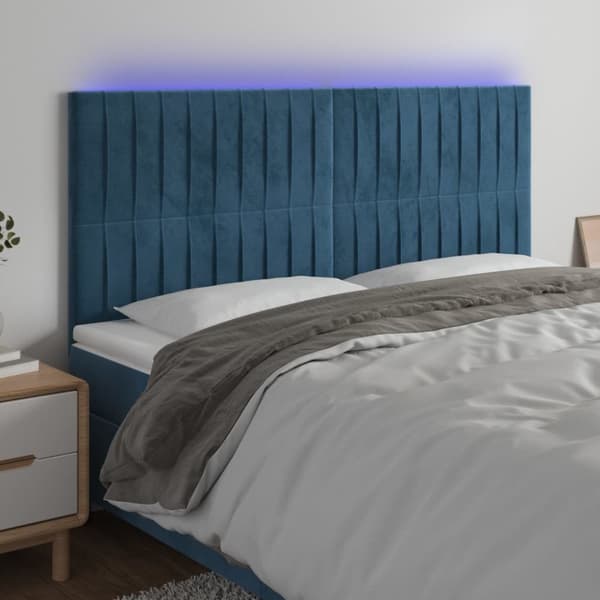 sengegavl med LED-lys 180x5x118/128 cm fløjl mørkeblå