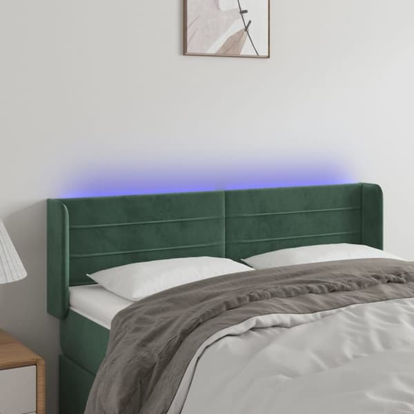 sengegavl med LED-lys 147x16x78/88 cm fløjl mørkegrøn