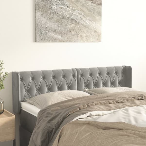 Sänggavel med kanter ljusgrå 163x16x78/88 cm sammet