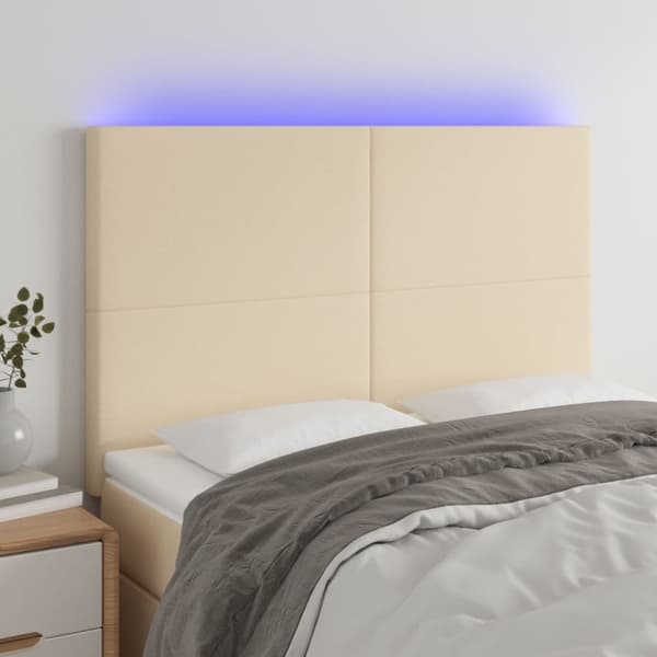 Sänggavel LED gräddvit 144x5x118/128 cm tyg