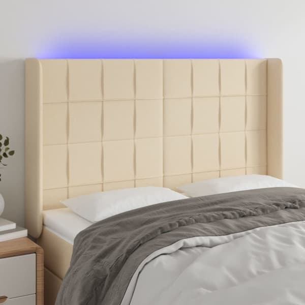 Sänggavel LED gräddvit 147x16x118/128 cm tyg