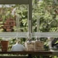 Miniatyrbild 2 av 5: Fotogenlampa / oljelampa Strömshaga Rak Stor, flätad korg, brännare i nickel, Ø100 mm x 330 mm
