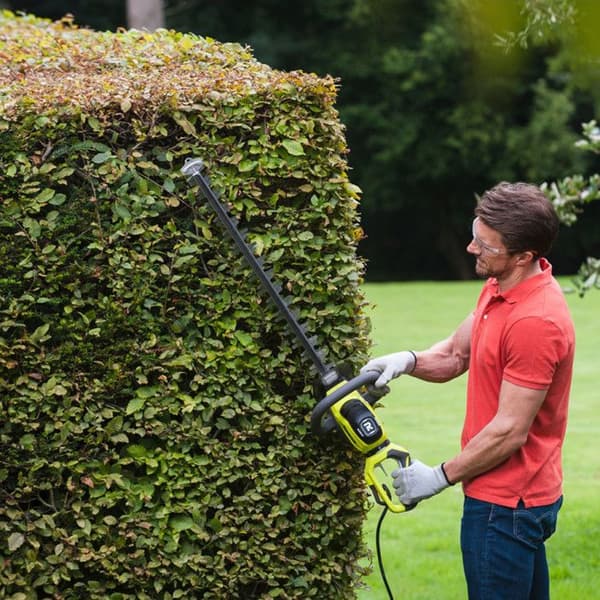 600 W häcksax - 60 cm blad - 28 mm avstånd - roterande bakre handtag - sågfunktion - HedgeSweep™