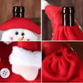 Miniatyrbild 3 av 4: TD® Jultomten en påse rött vin Dekorationer gammal man julvinflaskor firande originalglasögon söt julfest